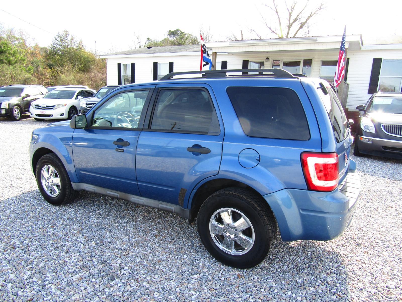 2010 Blue /Black Ford Escape XLT FWD (1FMCU0D72AK) with an 2.5L L4 DOHC 16V engine, Automatic transmission, located at 15016 S Hwy 231, Midland City, AL, 36350, (334) 983-3001, 31.306210, -85.495277 - Photo #5